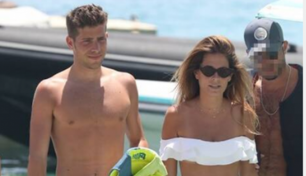 A generic square placeholder image with rounded corners in a figure.