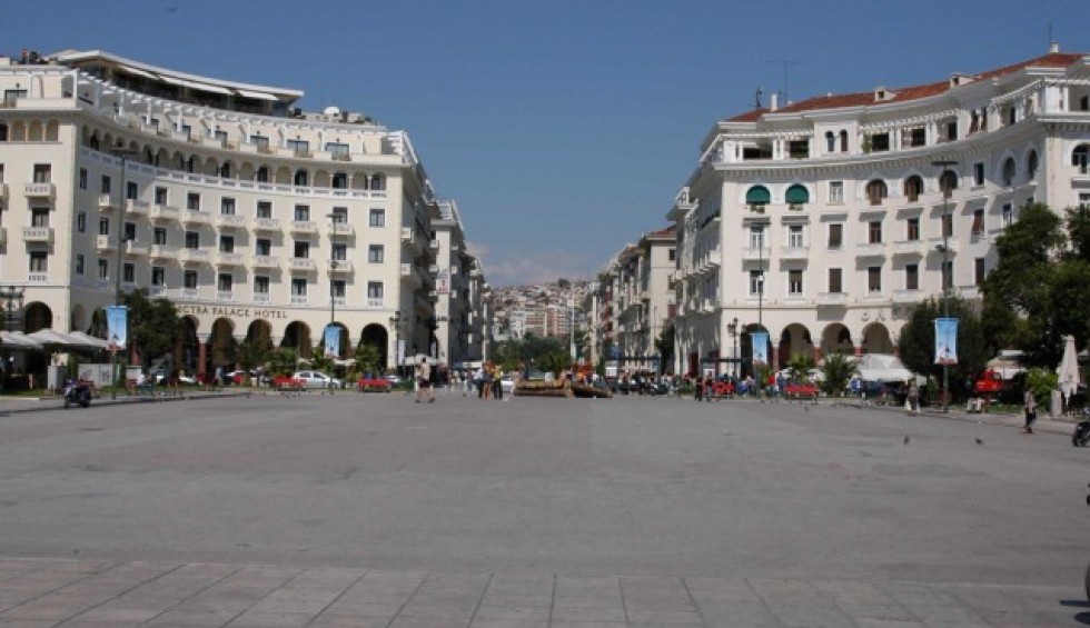 A generic square placeholder image with rounded corners in a figure.