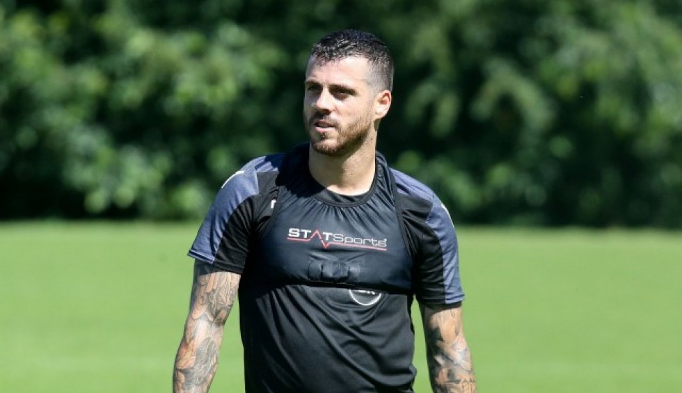 A generic square placeholder image with rounded corners in a figure.