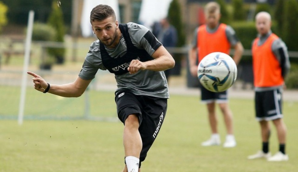 A generic square placeholder image with rounded corners in a figure.