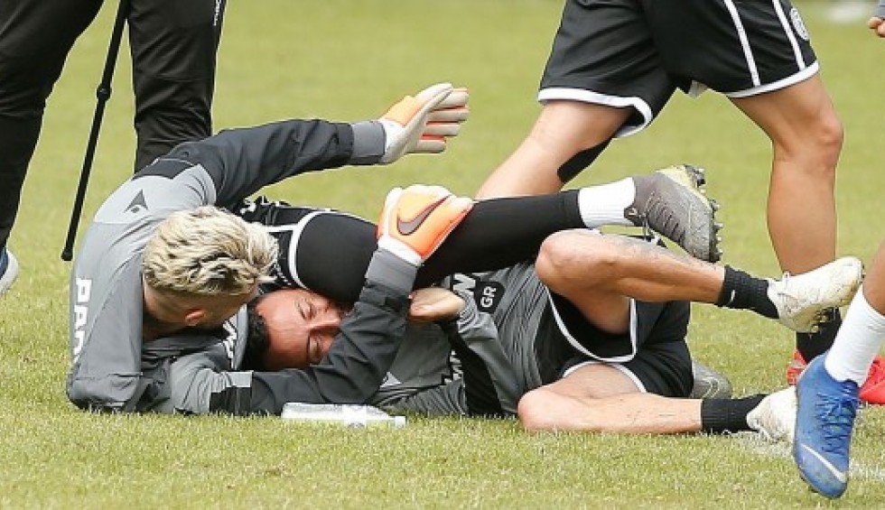 A generic square placeholder image with rounded corners in a figure.