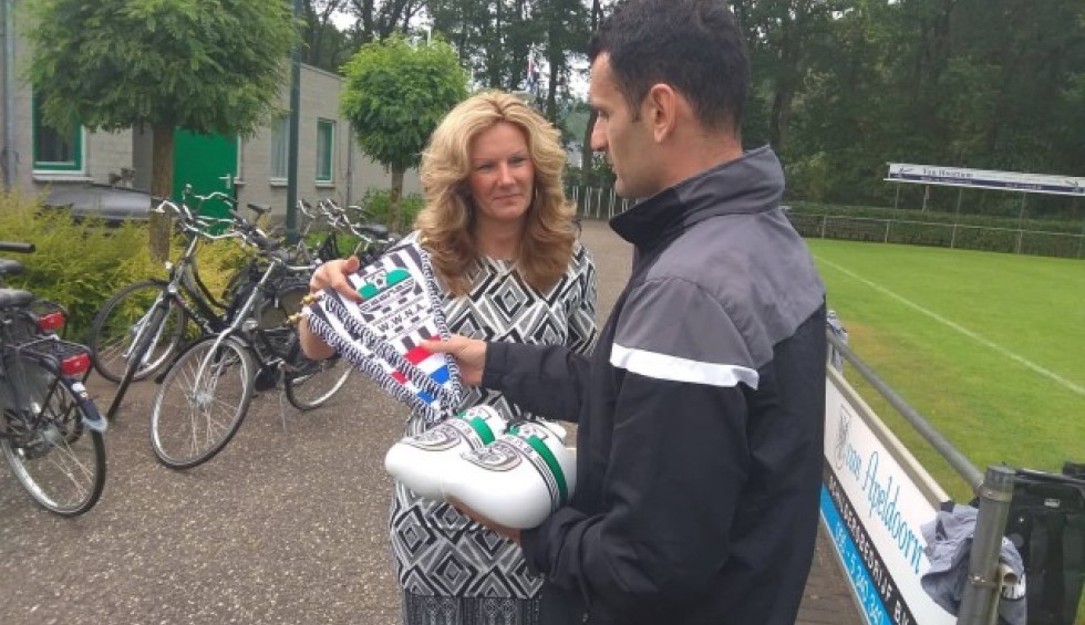 A generic square placeholder image with rounded corners in a figure.