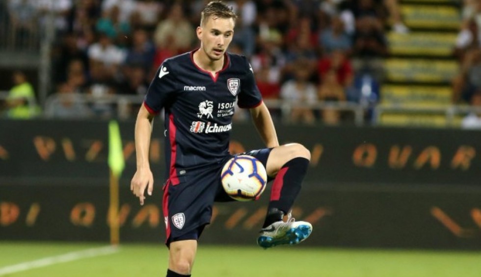 A generic square placeholder image with rounded corners in a figure.