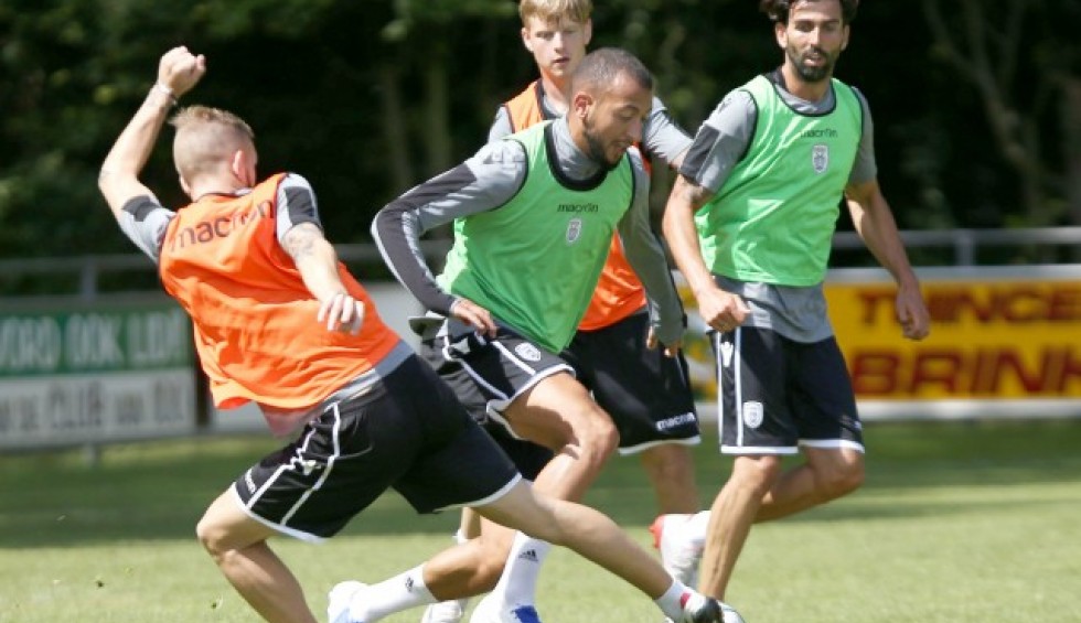 A generic square placeholder image with rounded corners in a figure.