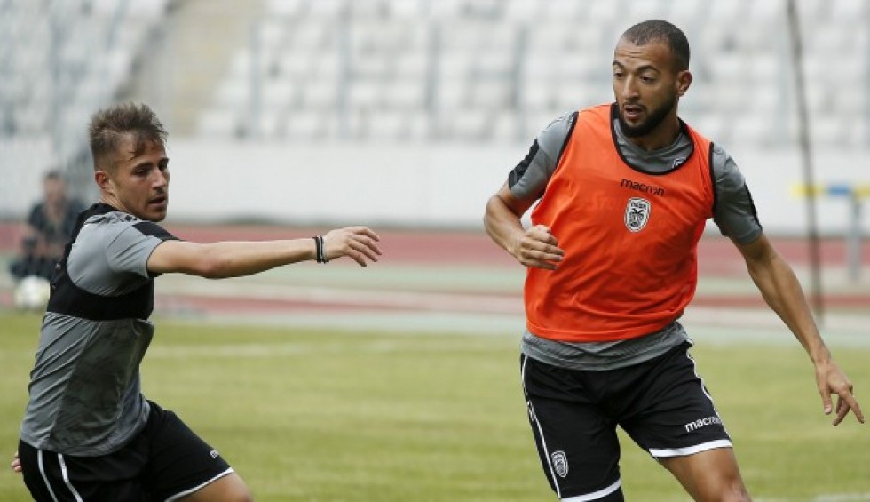 A generic square placeholder image with rounded corners in a figure.