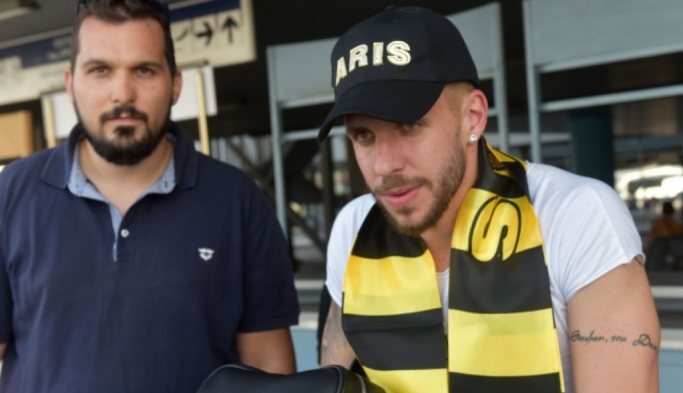 A generic square placeholder image with rounded corners in a figure.