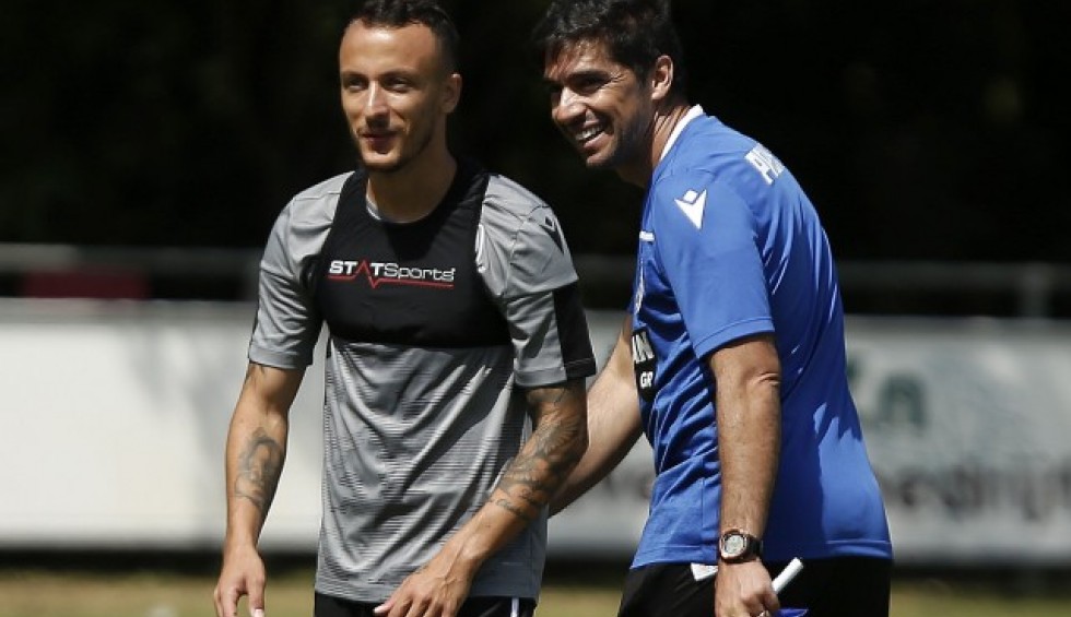 A generic square placeholder image with rounded corners in a figure.