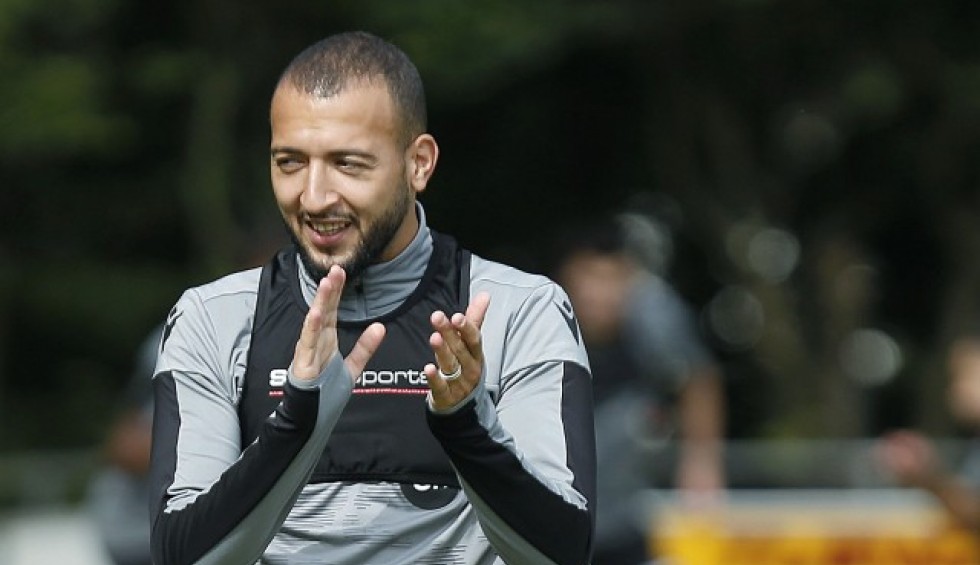 A generic square placeholder image with rounded corners in a figure.