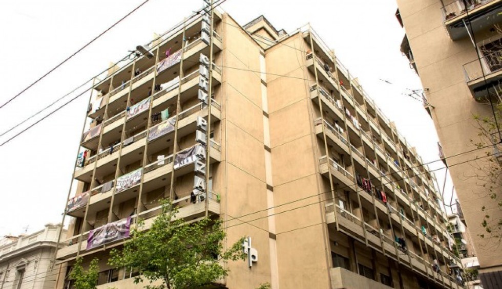 A generic square placeholder image with rounded corners in a figure.