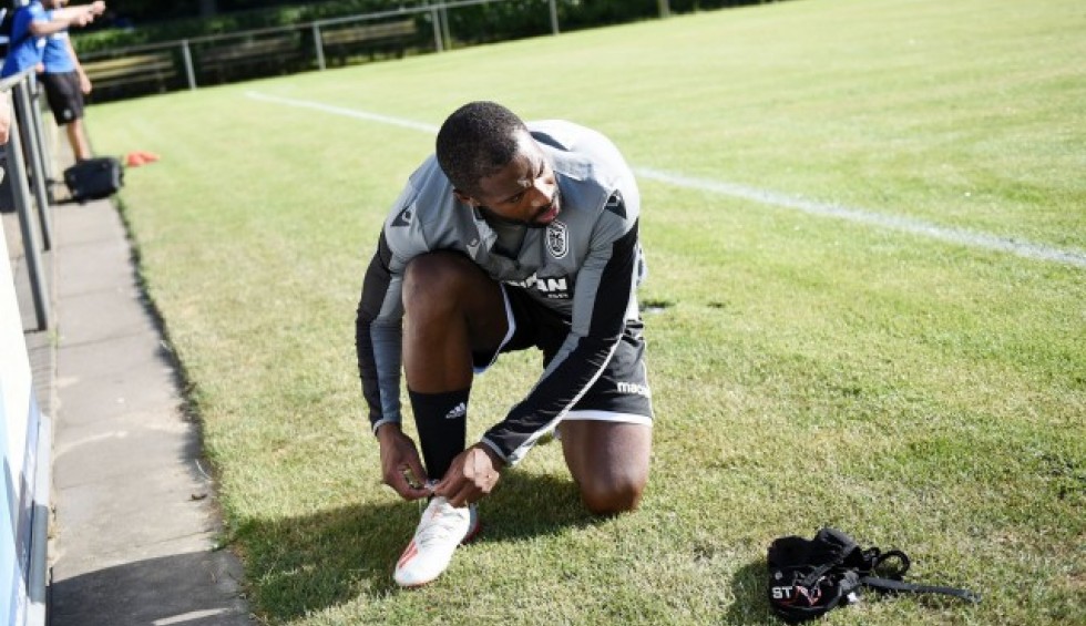 A generic square placeholder image with rounded corners in a figure.