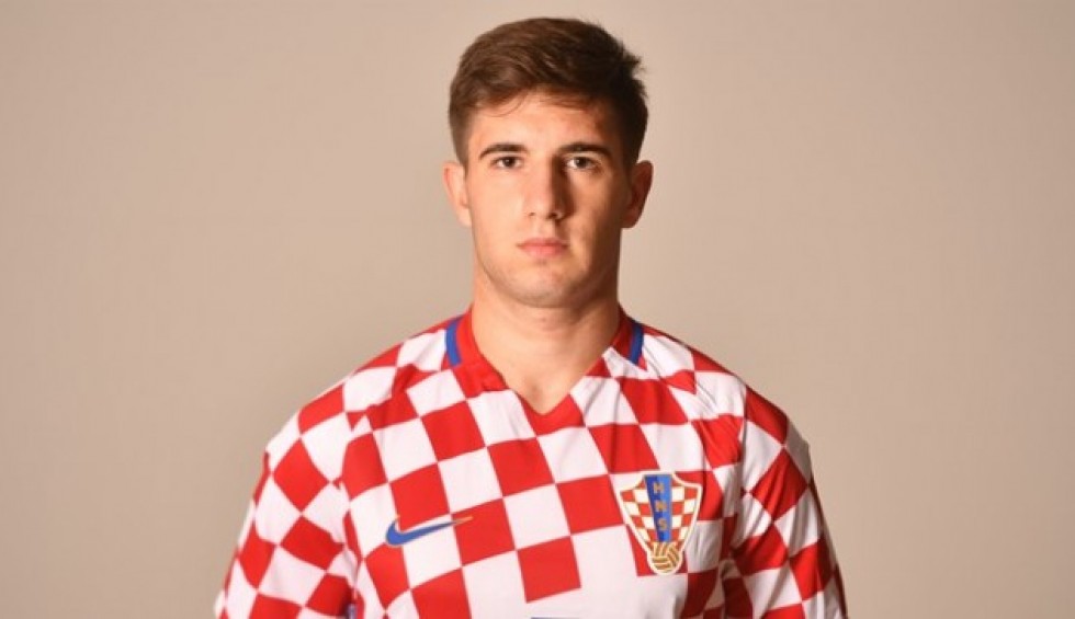 A generic square placeholder image with rounded corners in a figure.