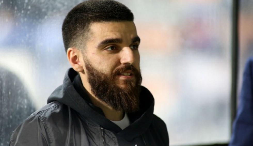 A generic square placeholder image with rounded corners in a figure.