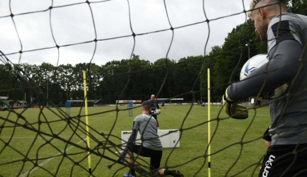 A generic square placeholder image with rounded corners in a figure.