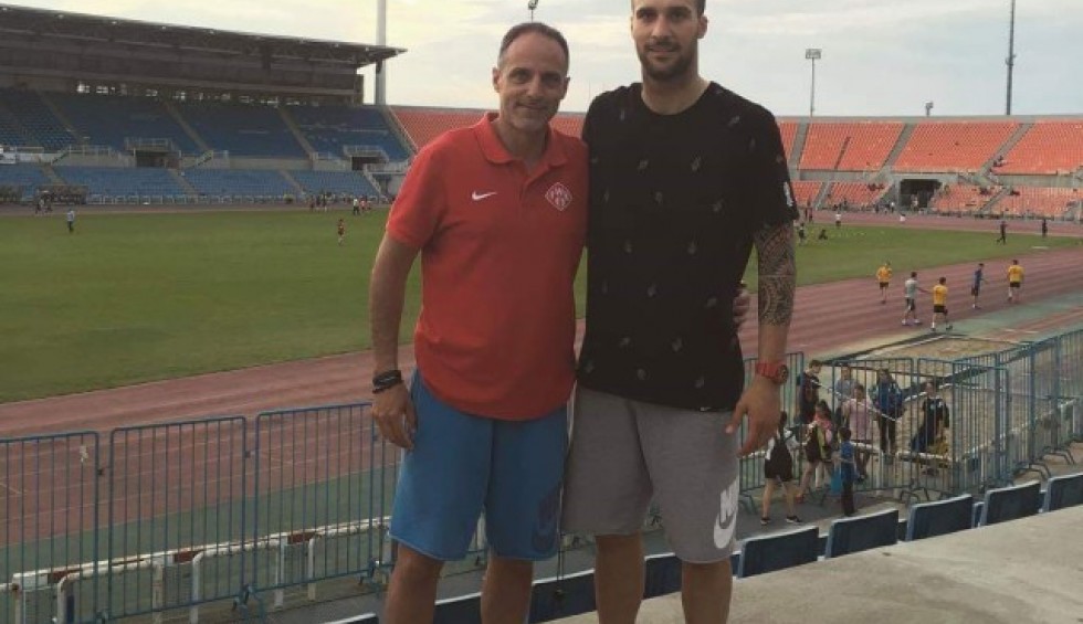 A generic square placeholder image with rounded corners in a figure.