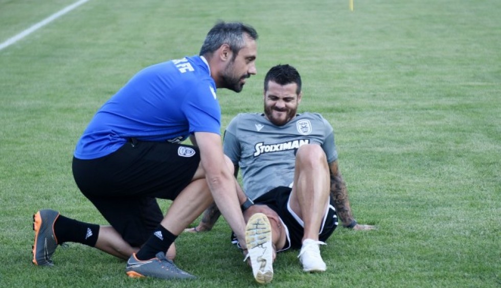 A generic square placeholder image with rounded corners in a figure.