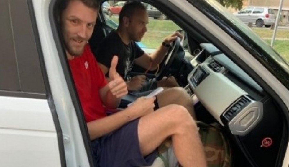 A generic square placeholder image with rounded corners in a figure.