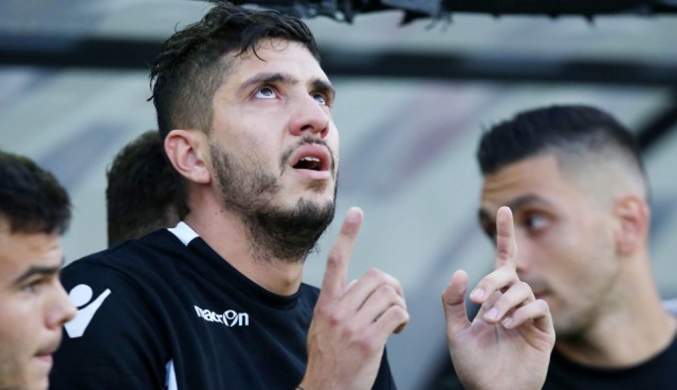 A generic square placeholder image with rounded corners in a figure.