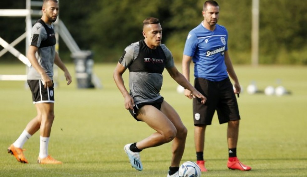 A generic square placeholder image with rounded corners in a figure.