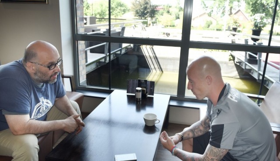 A generic square placeholder image with rounded corners in a figure.