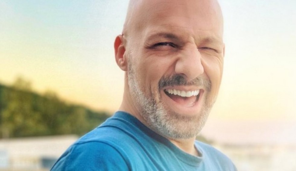 A generic square placeholder image with rounded corners in a figure.