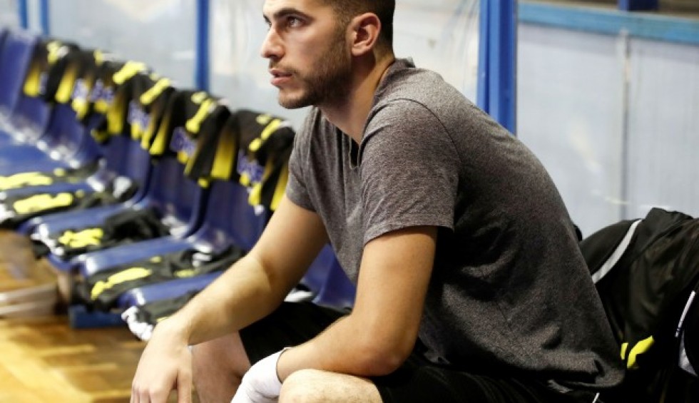 A generic square placeholder image with rounded corners in a figure.