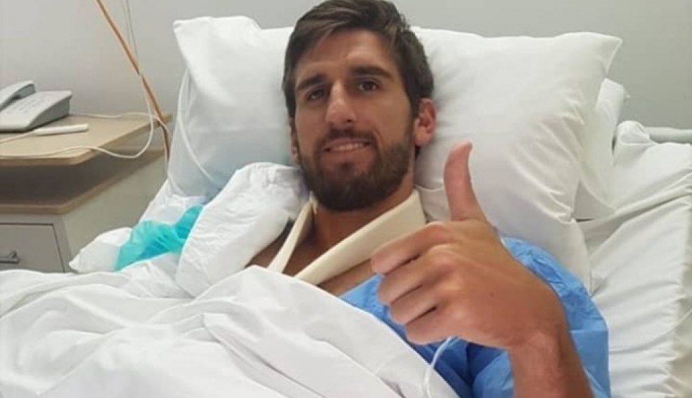 A generic square placeholder image with rounded corners in a figure.