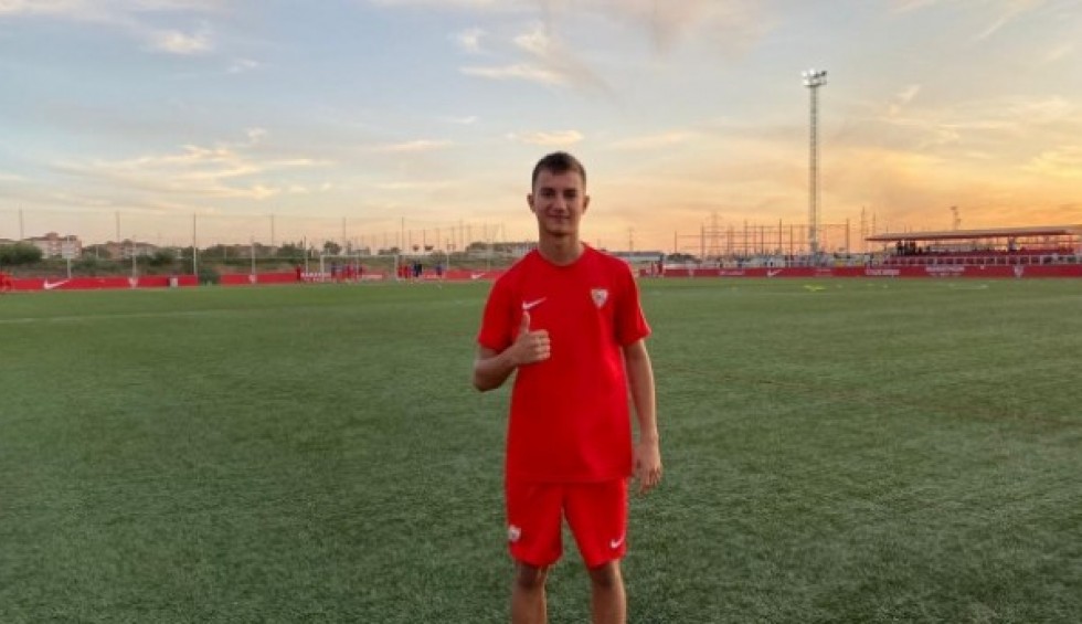 A generic square placeholder image with rounded corners in a figure.