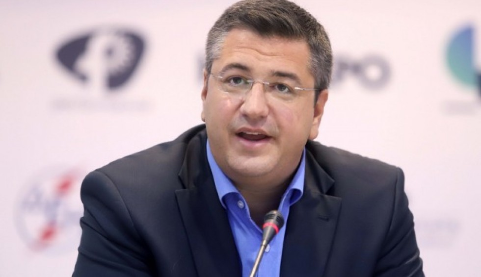 A generic square placeholder image with rounded corners in a figure.