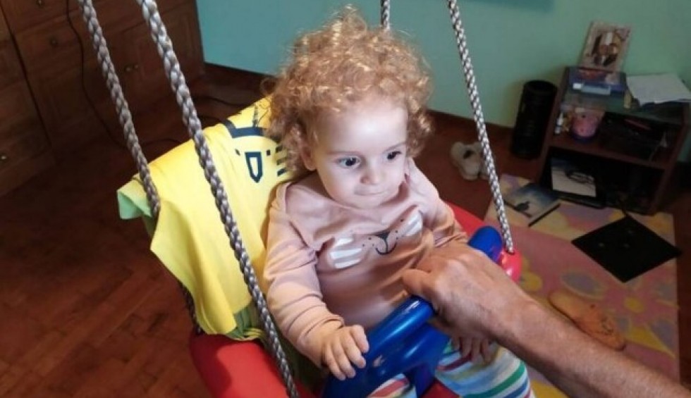 A generic square placeholder image with rounded corners in a figure.