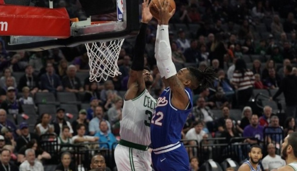 A generic square placeholder image with rounded corners in a figure.