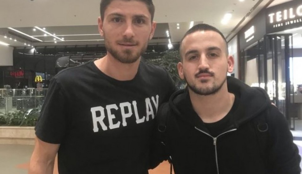 A generic square placeholder image with rounded corners in a figure.