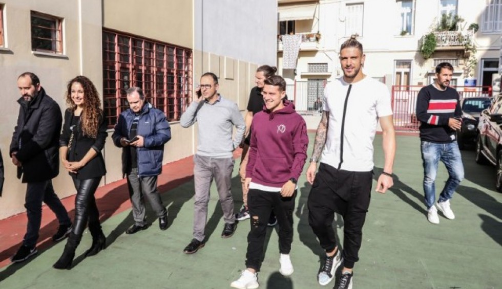 A generic square placeholder image with rounded corners in a figure.