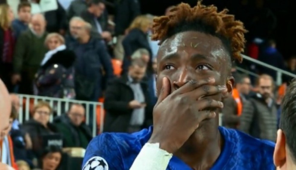 A generic square placeholder image with rounded corners in a figure.