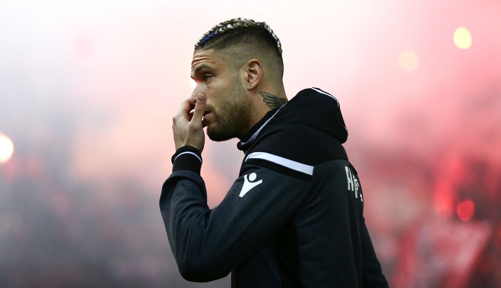 A generic square placeholder image with rounded corners in a figure.