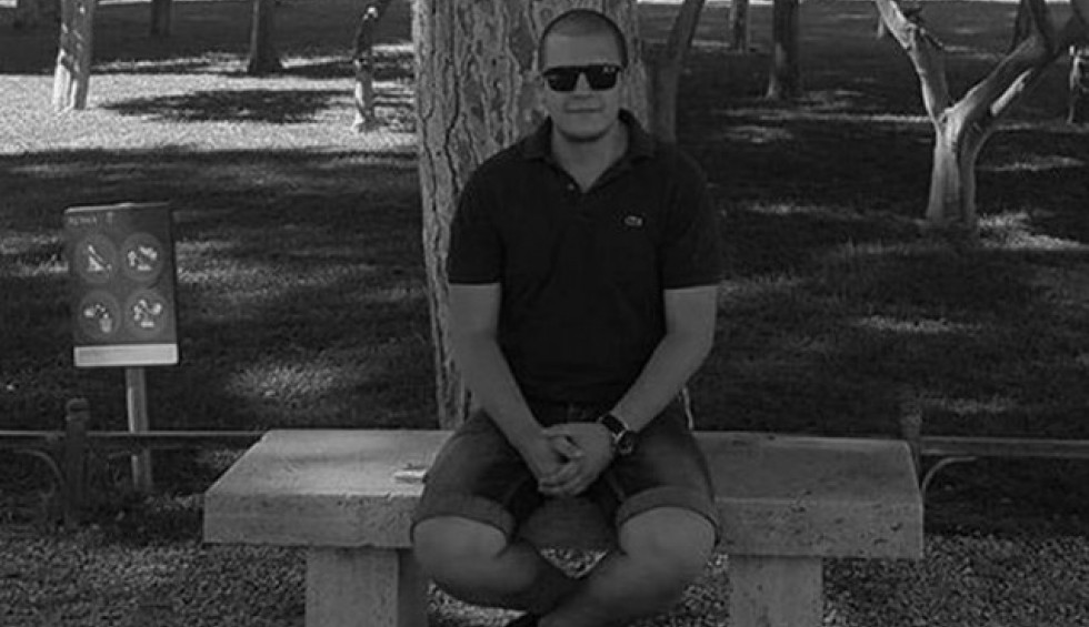 A generic square placeholder image with rounded corners in a figure.