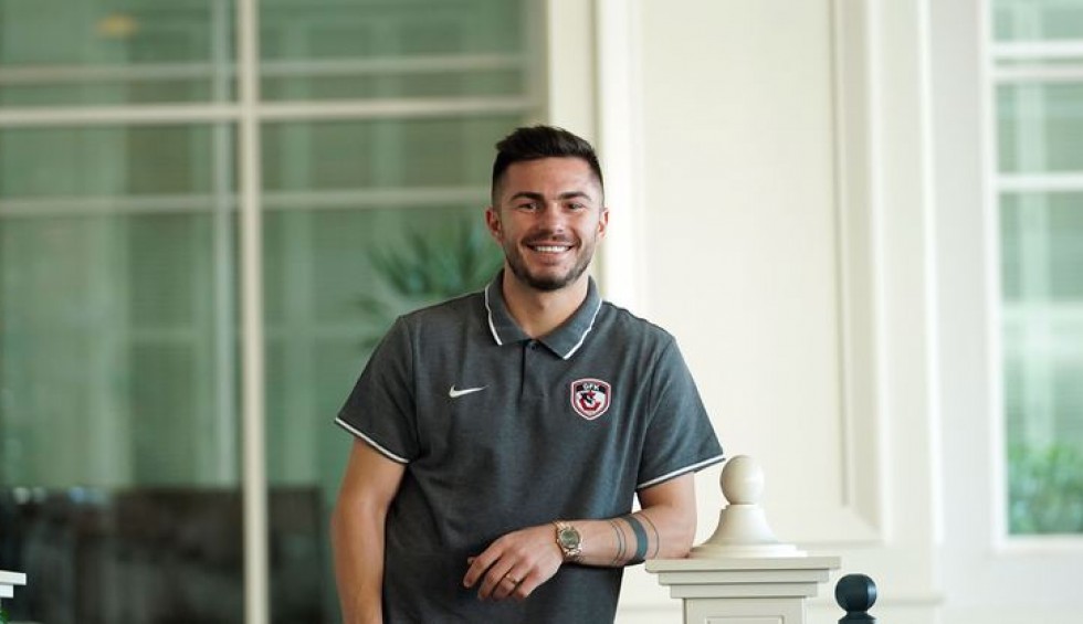 A generic square placeholder image with rounded corners in a figure.