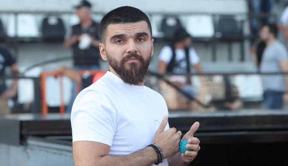 A generic square placeholder image with rounded corners in a figure.