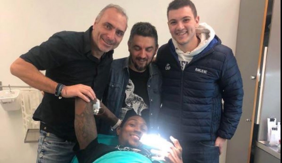 A generic square placeholder image with rounded corners in a figure.