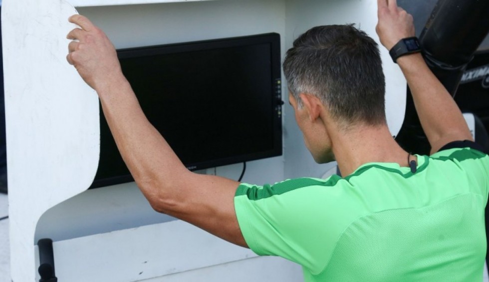 A generic square placeholder image with rounded corners in a figure.