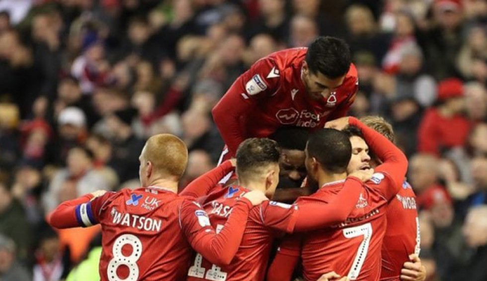 A generic square placeholder image with rounded corners in a figure.