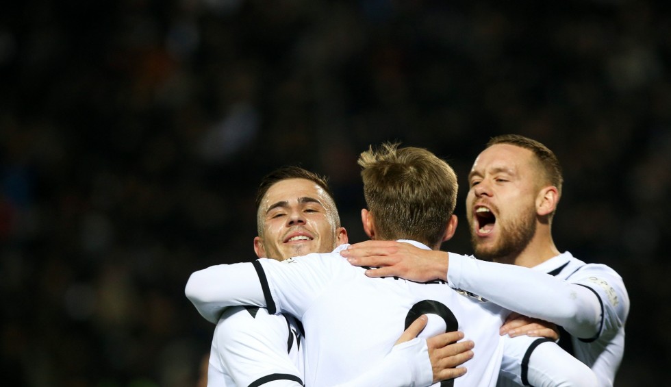 A generic square placeholder image with rounded corners in a figure.