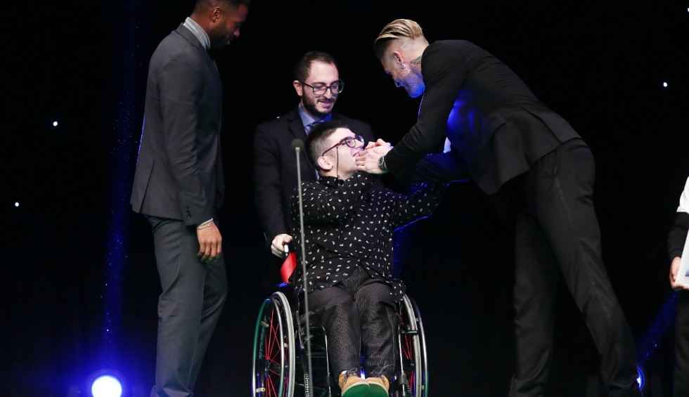 A generic square placeholder image with rounded corners in a figure.