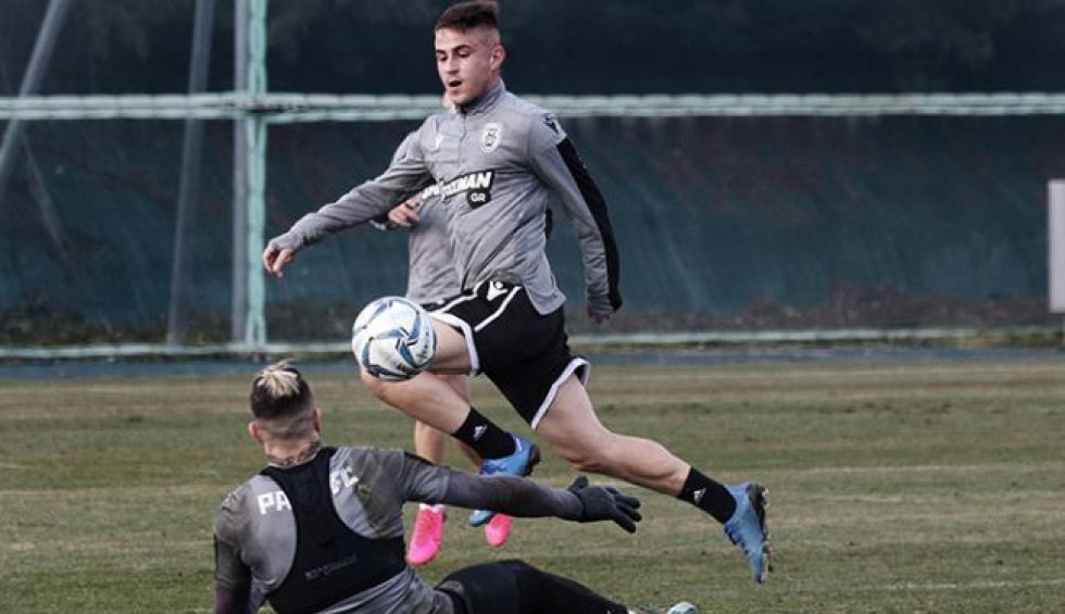 A generic square placeholder image with rounded corners in a figure.