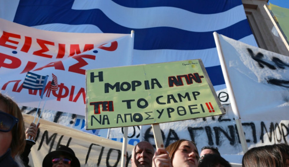 A generic square placeholder image with rounded corners in a figure.