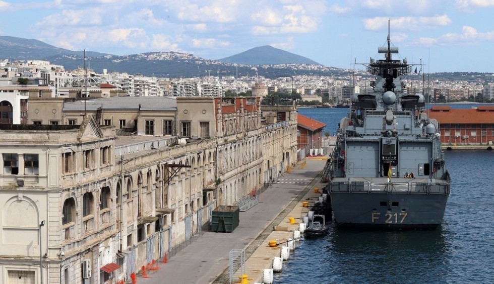 A generic square placeholder image with rounded corners in a figure.