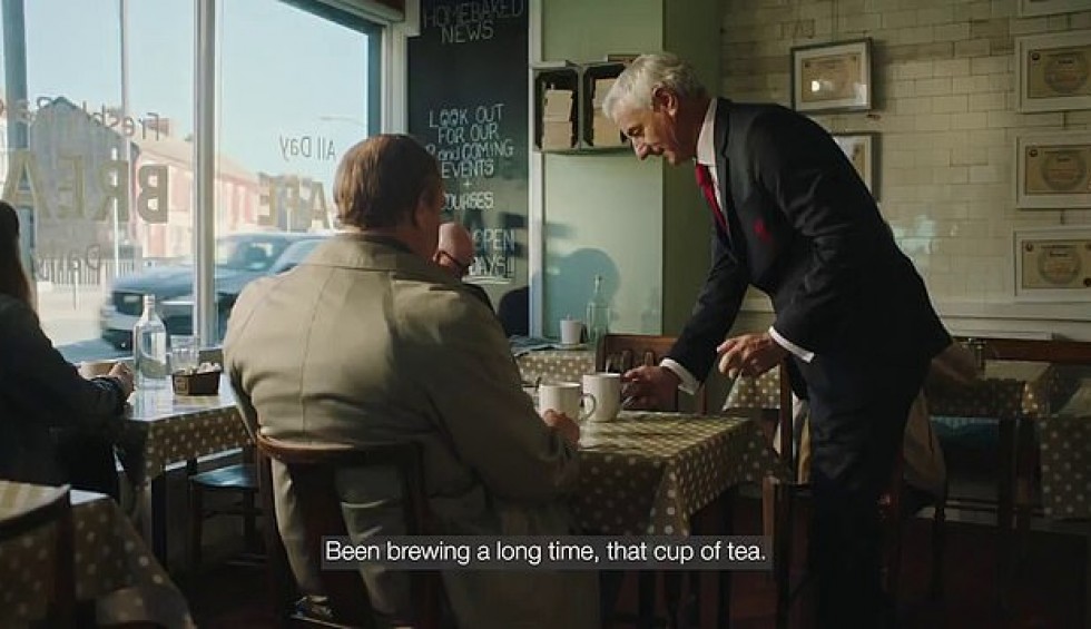 A generic square placeholder image with rounded corners in a figure.