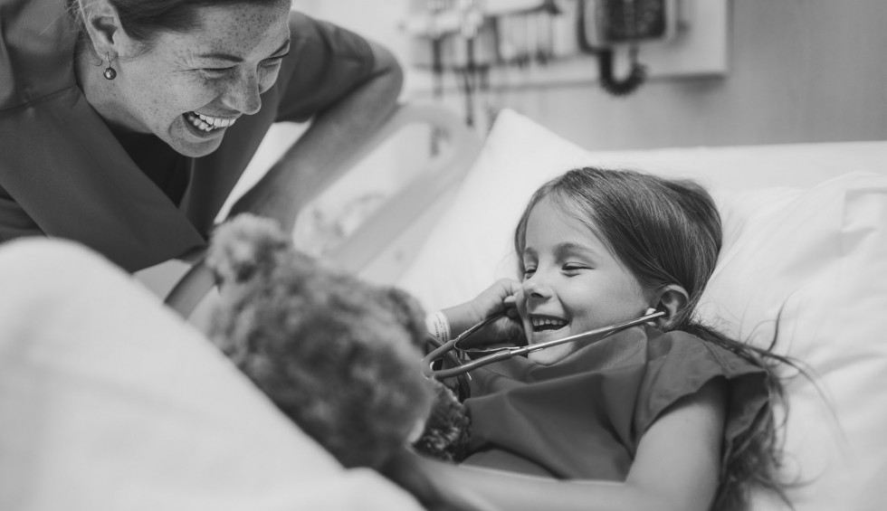 A generic square placeholder image with rounded corners in a figure.