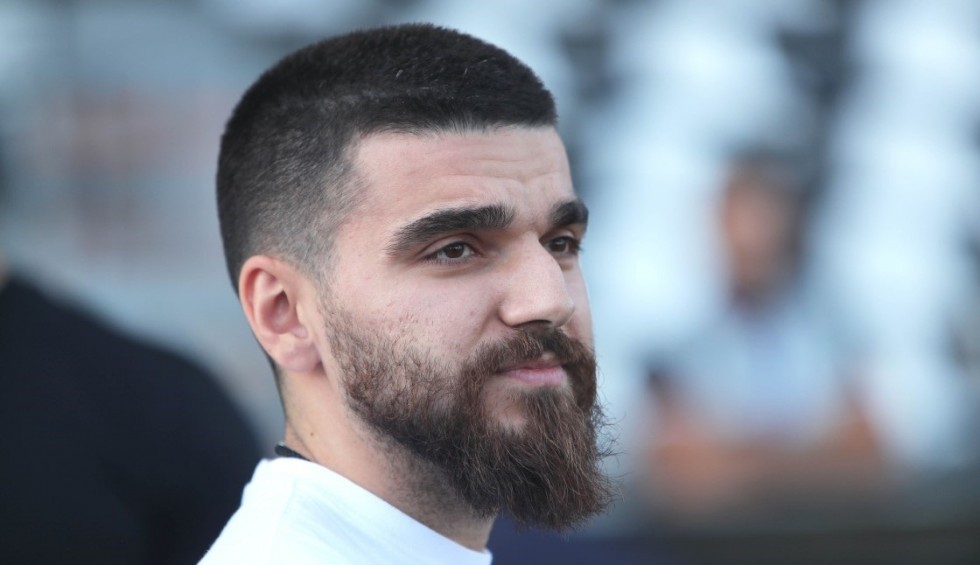 A generic square placeholder image with rounded corners in a figure.