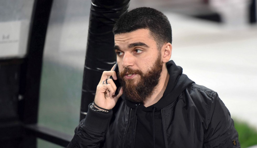 A generic square placeholder image with rounded corners in a figure.