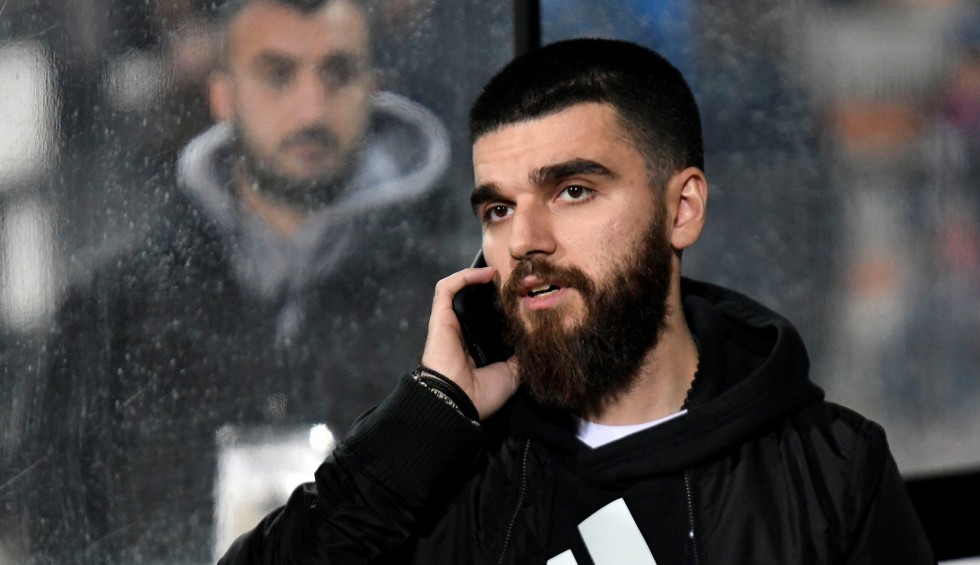 A generic square placeholder image with rounded corners in a figure.